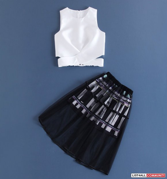 White top with black skirt